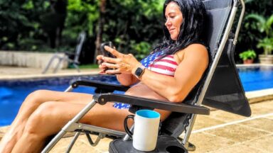 jodi rund fitness american flag bikini sitting in beach chair